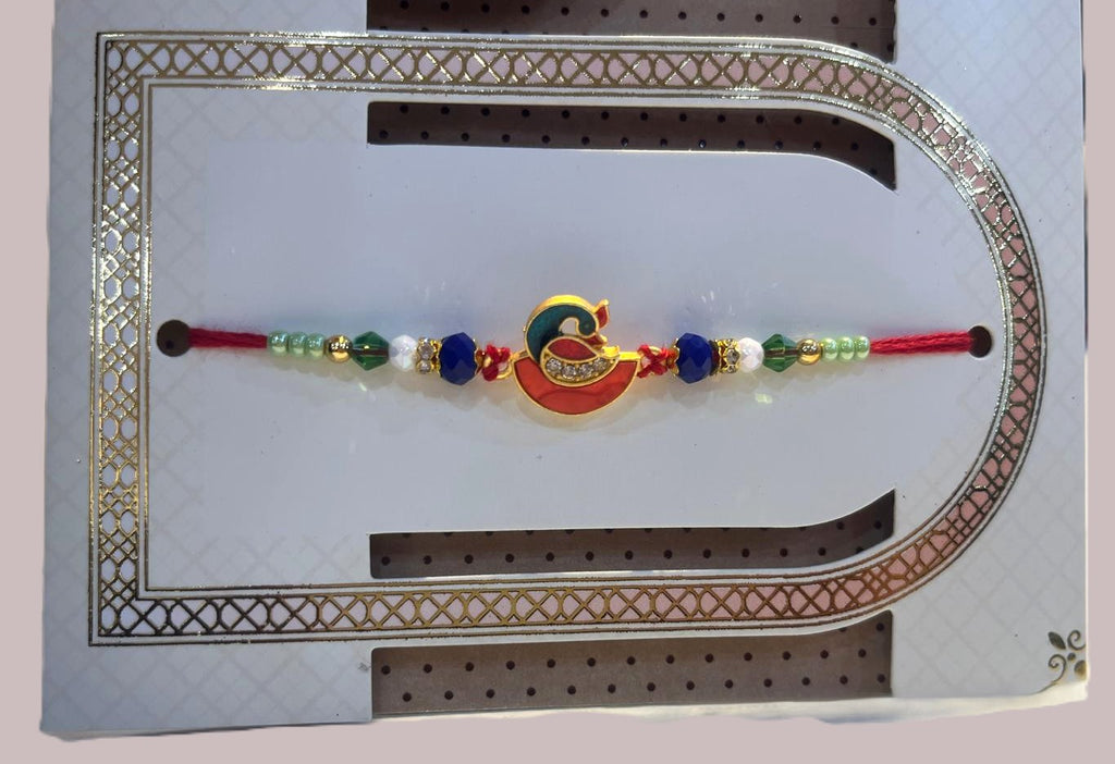 Elegant themed peacock rakhi- Red