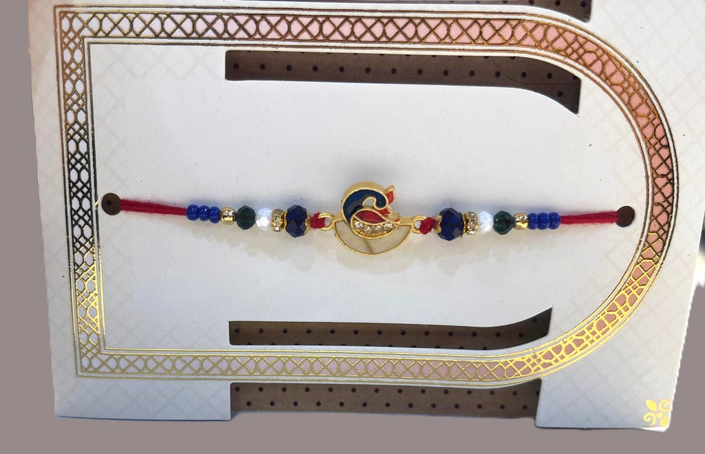 Elegant themed peacock rakhi- White